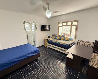 Pé na Areia Praia da Tupi - Praia Grande - Bedroom