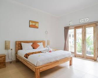 Karan Homestay Canggu - North Kuta - Bedroom