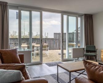 Welcome in - Appartement - Paviljoenwei 4 - Sneek 'Havenzicht' - Offingawier - Sala de estar