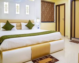 Treebo Oasis, Laxmisagar - בובנשוואר - חדר שינה