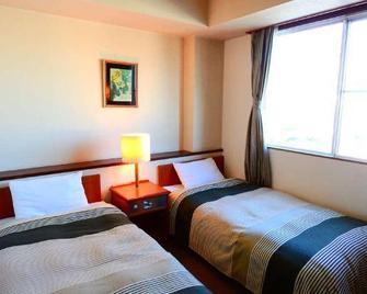 Komagane Green Hotel - Komagane - Schlafzimmer
