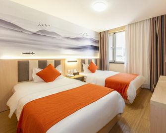 Dalian Tangyue Hot Spring Hotel - Dalian - Yatak Odası