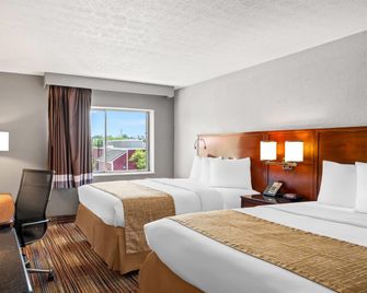 Travelodge by Wyndham Bloomington - Bloomington - Schlafzimmer