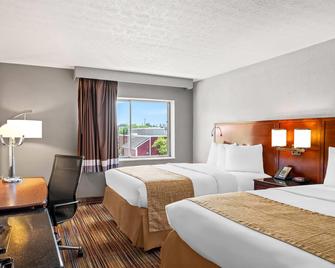 Travelodge by Wyndham Bloomington - בלומינגטון - חדר שינה