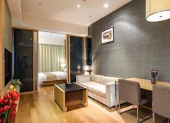 Xingyi International Hotel Poly Store - Guangzhou - Living room