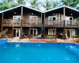 Casa Obrigado Beach Cottages & Spa - Morjim - Piscina