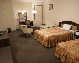 Nobeoka Urban Hotel - Nobeoka - Slaapkamer