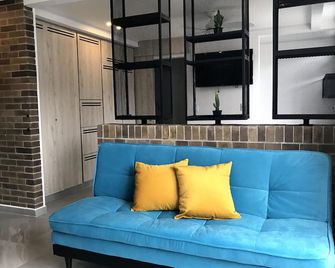 Waiki Apartaestudio Amoblados - Ibagué - Living room