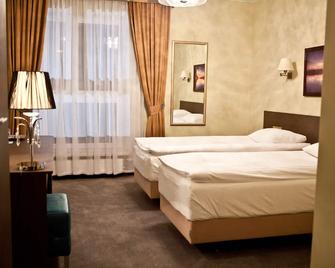 호텔 소코로브스카 에어포트 모들린 - 노비드부르마조비에스키 - 침실