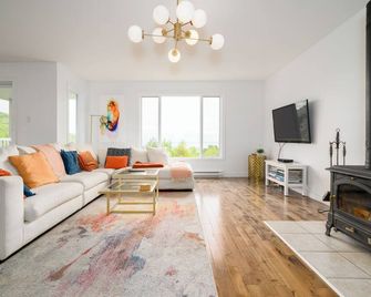 Hôtel à la maison - Le Beau-Mont, fleuve et spa - Petite-Rivière - Living room