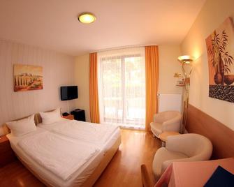 Hotel Schmid - Bad Bellingen - Спальня