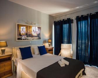 Xenia Ionis Luxury Apartments - Lixouri - Habitación