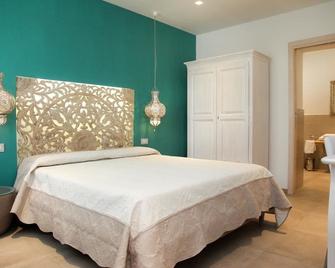 Hypnos Boutique Hotel - San Teodoro - Bedroom