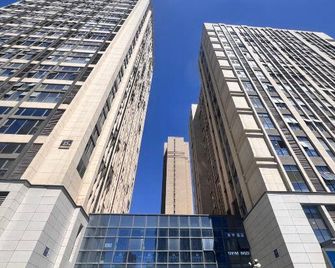 Haihai Homestay (Lanzhou Zhonghai Huanyucheng Zhonghai Plaza) - Lanzhou - Building