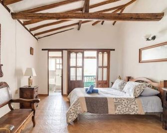 Colonial charm and family comfort steps from the plaza in Villa de Leyva. - Boyaca - Sala de estar