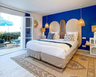 أوتل لو مويليدج - سان-تروبيه - غرفة نوم