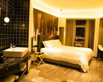 Momo Yishang Boutique Hotel - Changji - Bedroom
