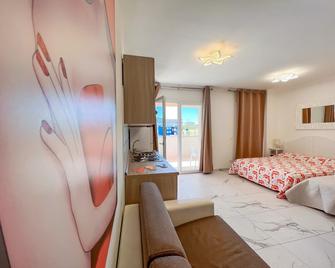 Appartamenti Saturno - Bibione - Schlafzimmer