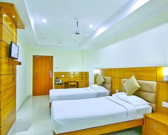 Sree Gokulam Residency Thrissur - Thrissur - Slaapkamer