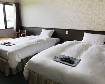 Sado Onsen Onjuku Oginoyu - Sado - Habitación