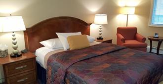 Lakeshore Inn & Suites - Anchorage - Schlafzimmer