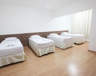 Hotel Perez - Pouso Alegre - Schlafzimmer