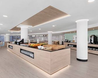 بالمانوفا سويتس باي تي آر إتش - ماجالوف - مطعم