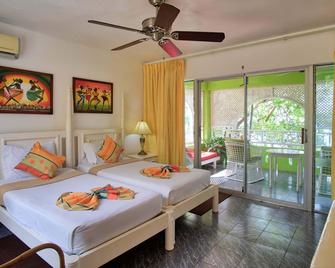 هيبيسكوس لودج - أوتشو ريوس - غرفة نوم