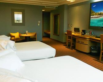 Suites Inn la Muralla Hotel & Spa - Metepec - Camera da letto