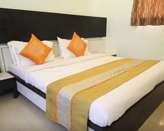 Treebo Skylon Hotel - Gandhinagar - Habitación