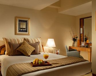 Orchard Point Serviced Apartments - Singapur - Schlafzimmer