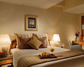 Orchard Point Serviced Apartments - Singapur - Schlafzimmer