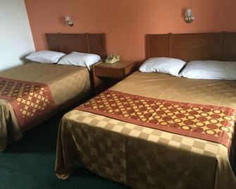 Economy Inn - Lawtey - Спальня