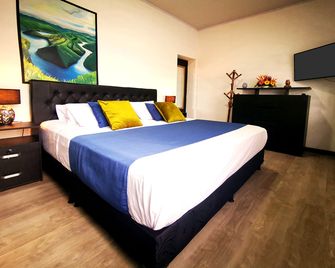 El Solar Casa Hotel - Manizales - Schlafzimmer