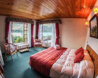 Hostería Pehoe - Estancia Pudeto - Bedroom