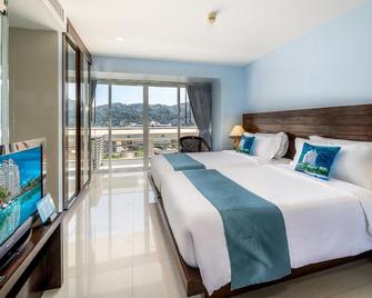 Andaman Beach Suites Hotel - Patong - Bedroom