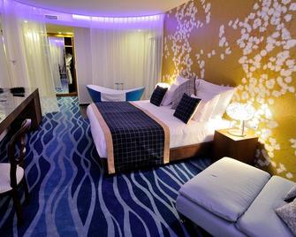 Hotel Cascade Resort & Spa - Demjén - Camera da letto