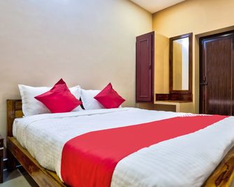 Grand Ocean Inn - Pondicherry - Schlafzimmer