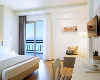 Ammon Zeus Luxury Beach Hotel - Kallithea - Bedroom