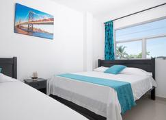 Hotel Sara Inn - Mompos - Slaapkamer