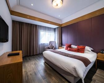 Sun Island Resorts, Shanghai - שנחאי - חדר שינה