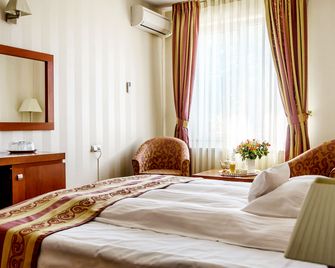 Pension Palazzo - סיביו - חדר שינה