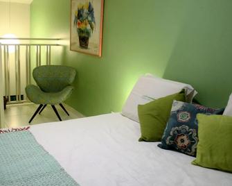 Pousada Casa Das Flores - Alto Paraíso de Goiás - Bedroom