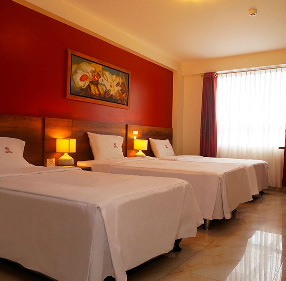 أوتل سنترال - تروجيلو - غرفة نوم