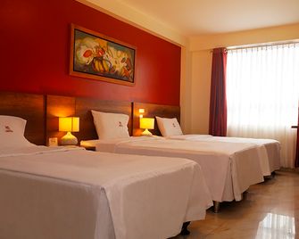 أوتل سنترال - تروجيلو - غرفة نوم