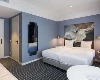 Corendon Urban Amsterdam Schiphol Airport Hotel - Бадхуведорп - Спальня