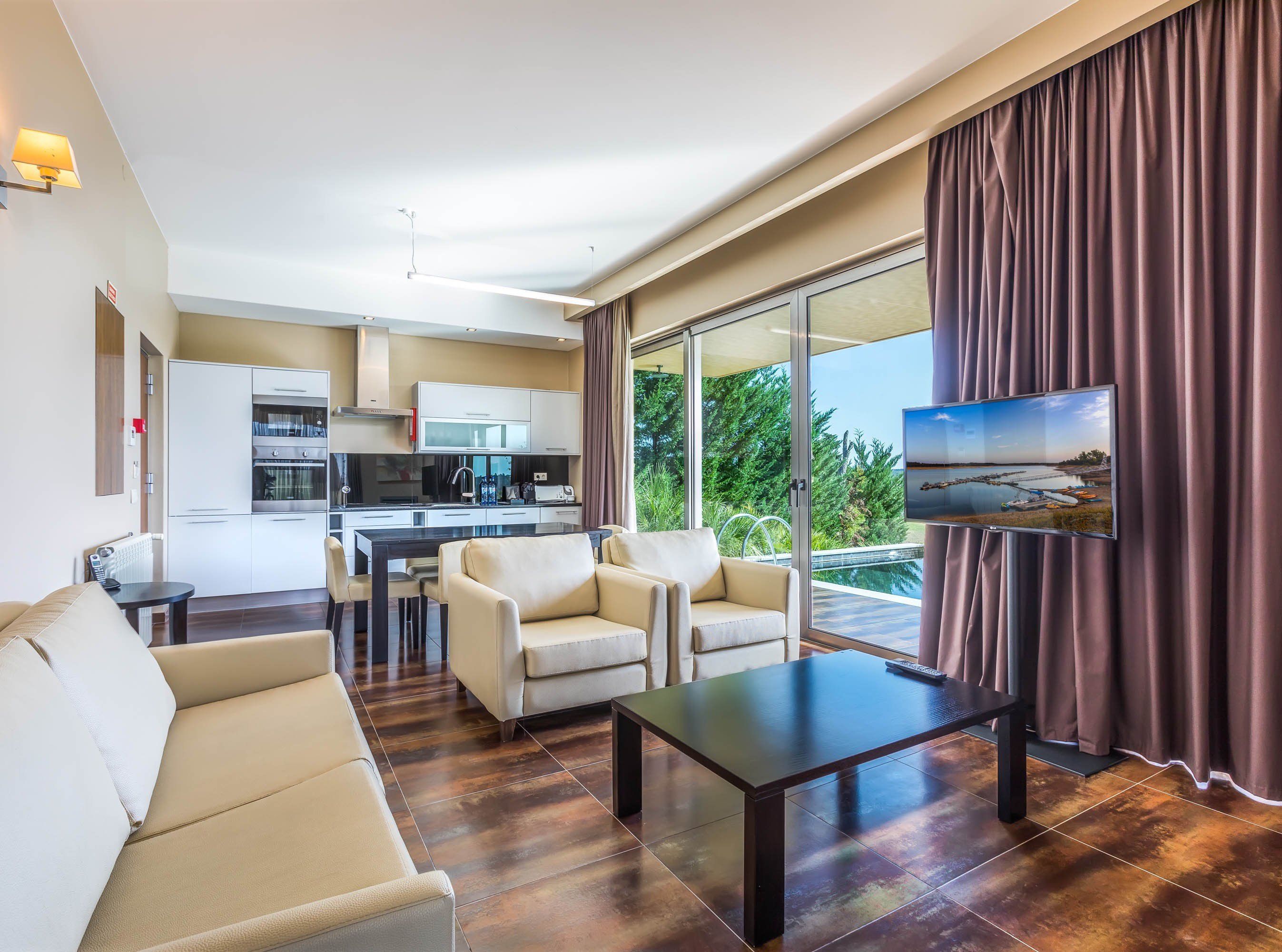 Living room view of null, located in null. Image provided by Official Hotel Information