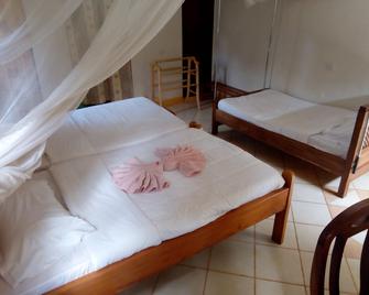 Ngorongoro Lodge and Campsite - Karatu - Bedroom