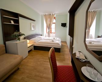 Hotel Amphone - ברנו - חדר שינה