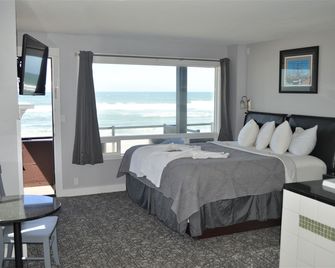 Beachfront Manor Hotel - לינקולן סיטי - חדר שינה